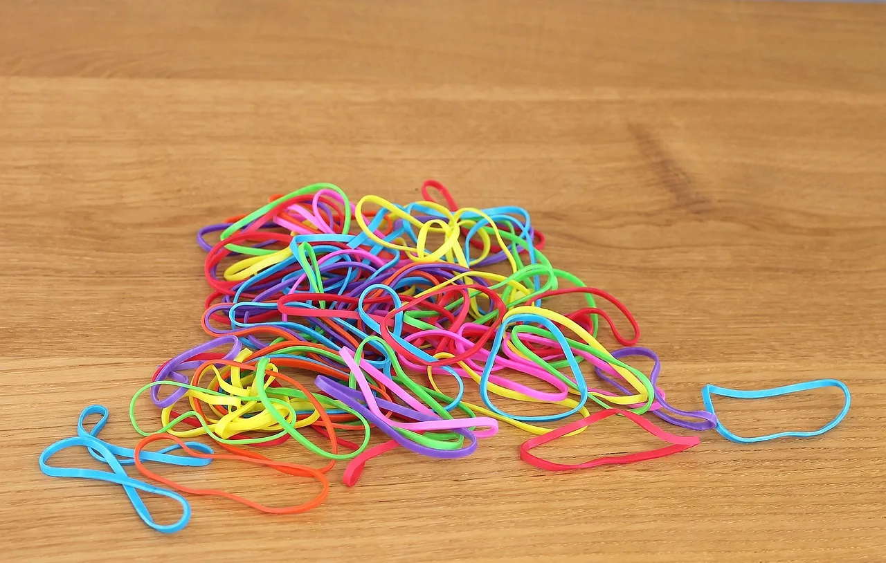 rubber band, rubber bands, colors, colored elastics, office supplies, rubber band, rubber band, rubber band, rubber band, rubber band, rubber bands. Archive materials fail quietly: plastics and rubber damage from the inside